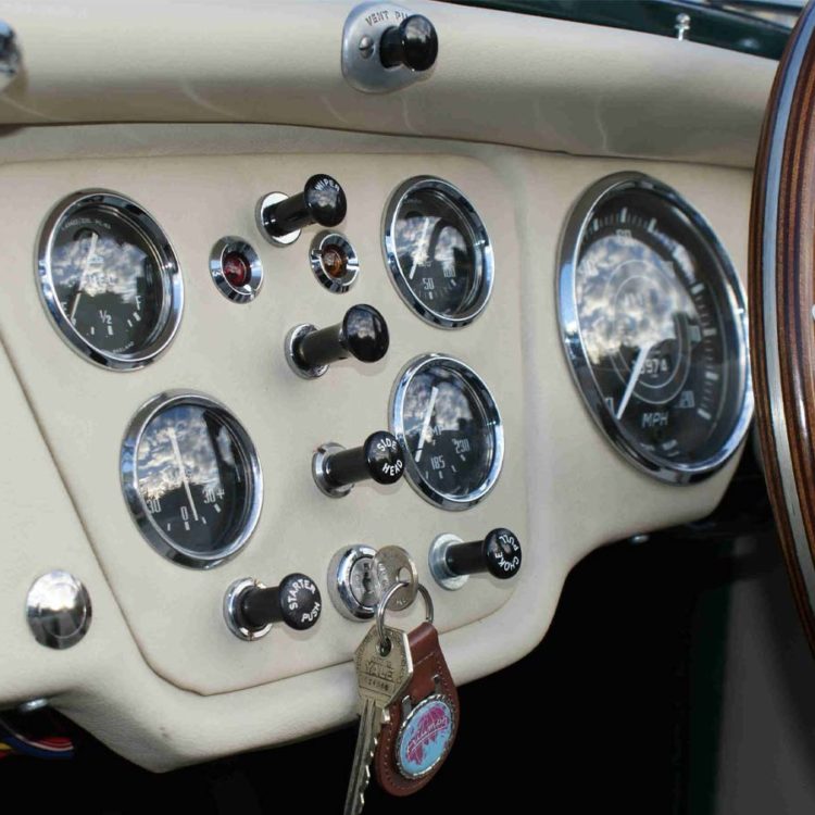 Triumph TR3A Dashboard Facia Panel trimmed with Parchment Vinyl.