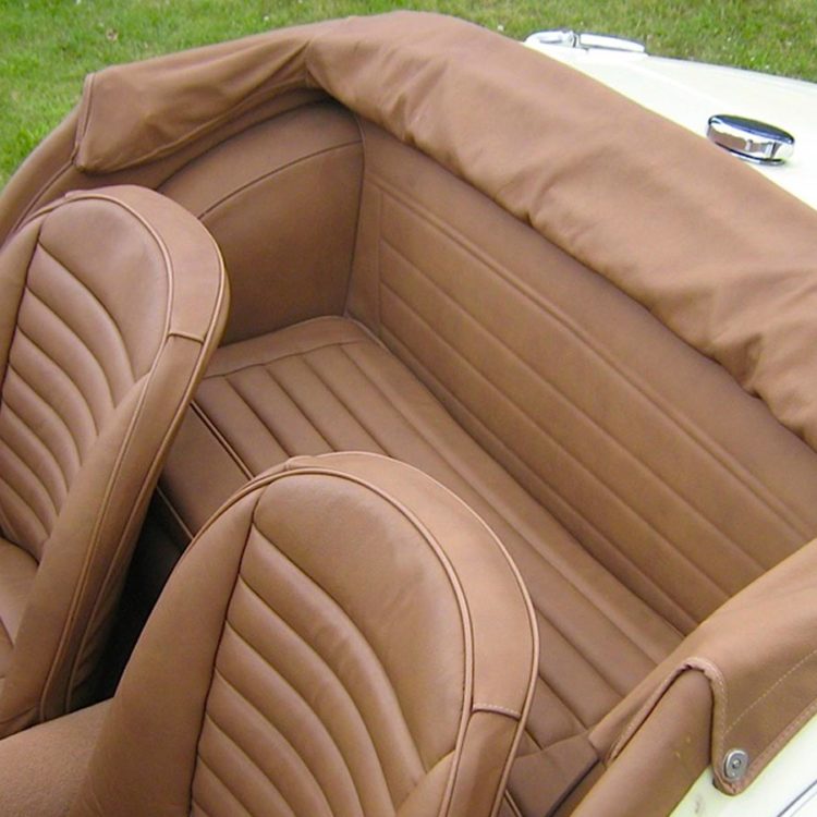 Triumph TR3A/B fitted with Cinnamon Leather Interior Trim Panels, Front & Rear Seats, and Hood Frame Cover.