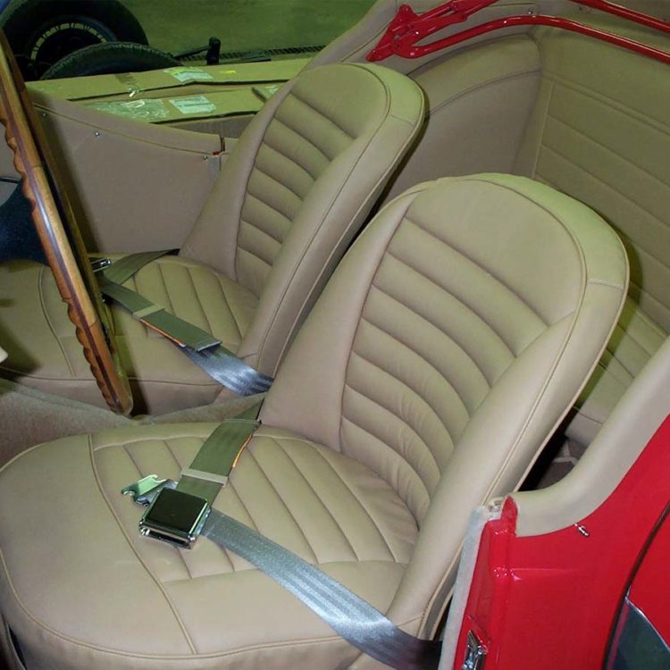 Triumph TR3A fitted with Biscuit Light Tan Vinyl Panels, LeatherFaced Front & Rear Seats, and a Cinnamon Wool Carpet Set.