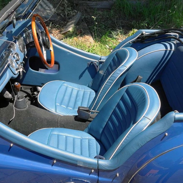 Triumph TR3A fitted with Midnight Blue Leather Interior Trim Panels, and all Leather Front Seat Covers.