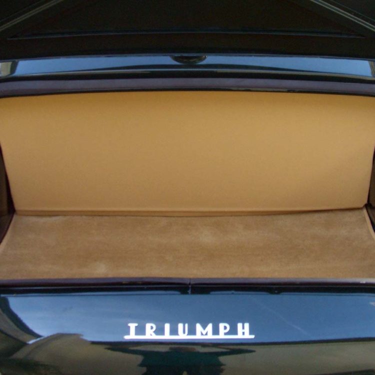 Triumph TR3A fitted with Palomino Wool Boot Trunk Mat, and Biscuit Light Tan Vinyl Trimmed Boot Liner Board.