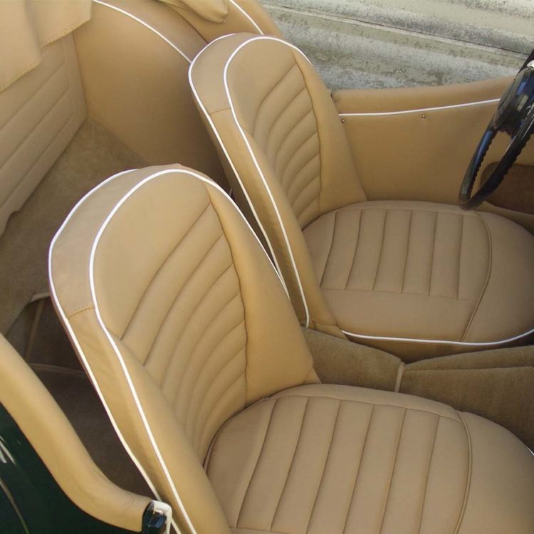 Triumph TR3A fitted with Biscuit Light Tan Leather Interior Trim Panels & Cappings, Seat Covers, and Palomino Wool Carpets.