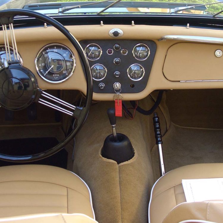 Triumph TR3A fitted with Biscuit Light Tan Leather Interior Trim Panels and Dash, Seat Covers and Palomino Wool Carpets.
