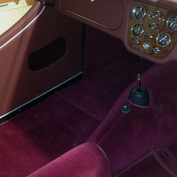 Triumph TR3A/B fitted with Maroon Leather Interior Trim Panels, and a Maroon Wool Carpet Set.