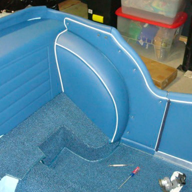Triumph TR3A fitted with Midnight Blue Vinyl Trim Panels, and Leather Cappings.
