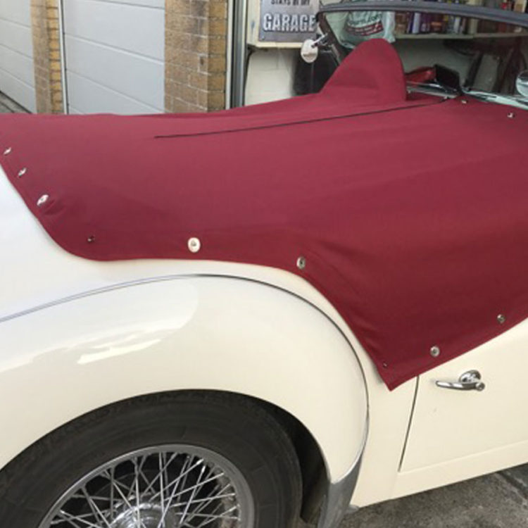 Triumph TR3A/B fitted with Red Deluxe Mohair Canvas Tonneau Cover.