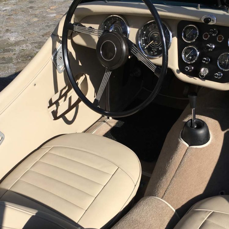 Triumph TR3A fitted with Sand Leather Interior Trim Panels, Seat Covers, and a Fawn Wool Carpet Set.
