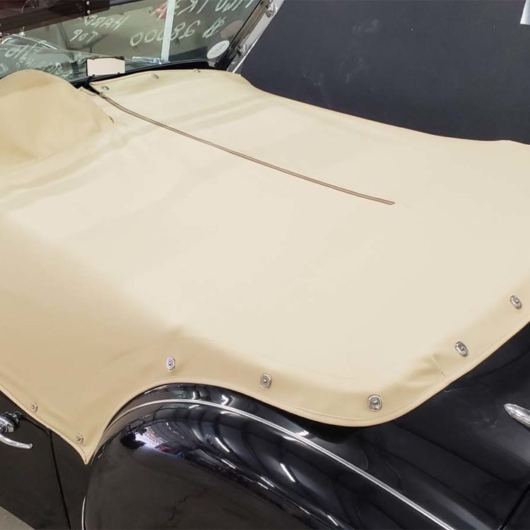 Triumph TR3A fitted with a Beige Mohair Tonneau Cover.
