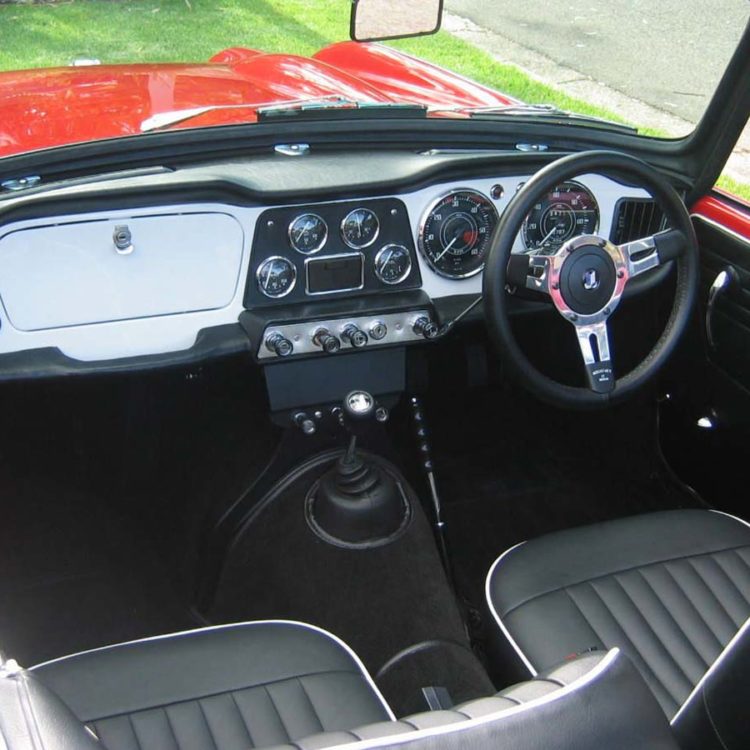 Triumph TR4 fitted with a Black Vinyl Interior Trim Panels, and LeatherFaced Front Seat Covers.