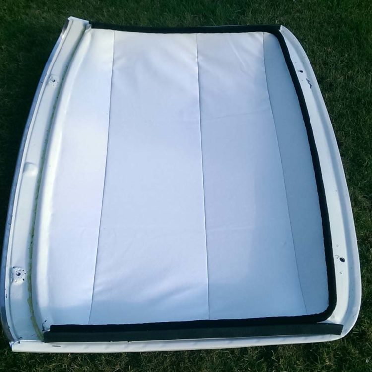 Triumph TR4 fitted with a White PVC Surrey Top Headliner.