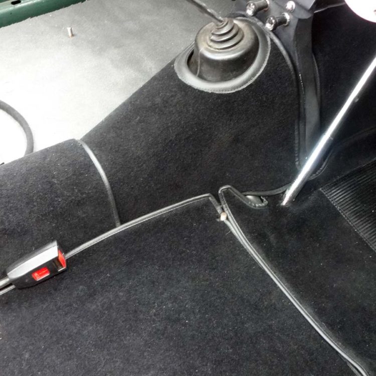 Triumph TR4 fitted with a Black Wool Carpet Set (mount fixings for non-standard seats).