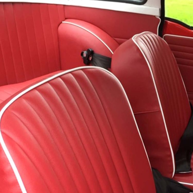 Triumph TR4 fitted with Cherry Red Vinyl Trim Panels and Front Seat Covers (“Late Style”), and Rear Seat Cushion Cover.