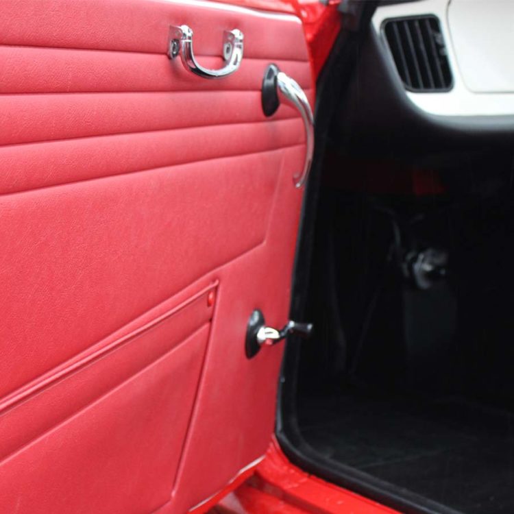 Triumph TR4 fitted with Cherry Red Vinyl Door Panels.