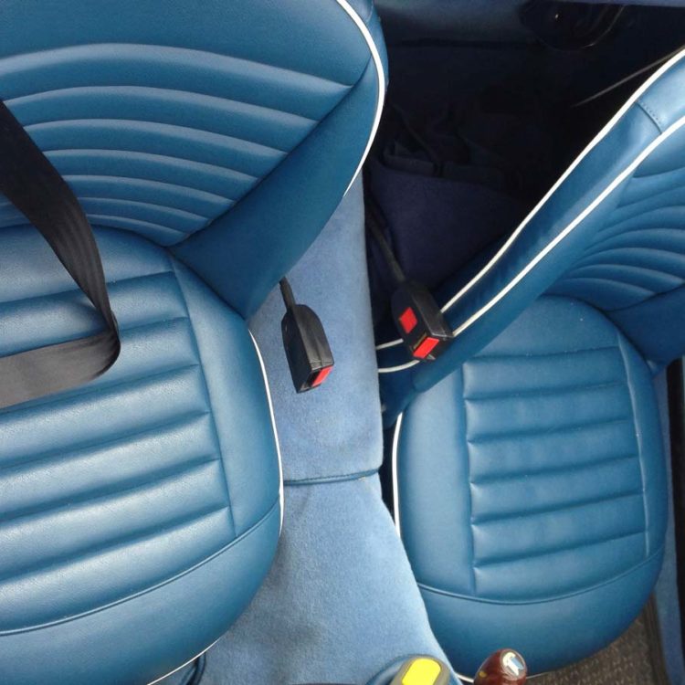 Triumph TR4 fitted with Midnight Blue Vinyl Seat Covers, and Shadow Blue Wool Carpets.