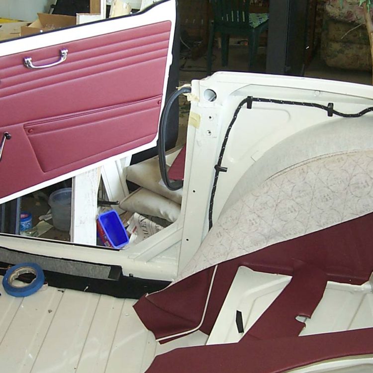 Triumph TR4 fitted with Matador Red Vinyl Door Panels, and Wheelarch Covers.