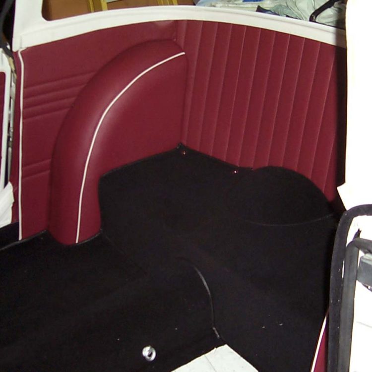 Triumph TR4 fitted with Matador Red Vinyl Panels, and a Black Wool Carpet Set.