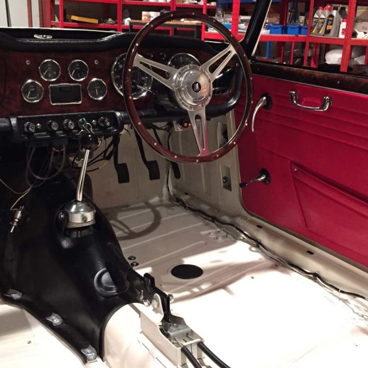 Triumph TR4A fitted with Bright Red Leather Door Assembly Panels.