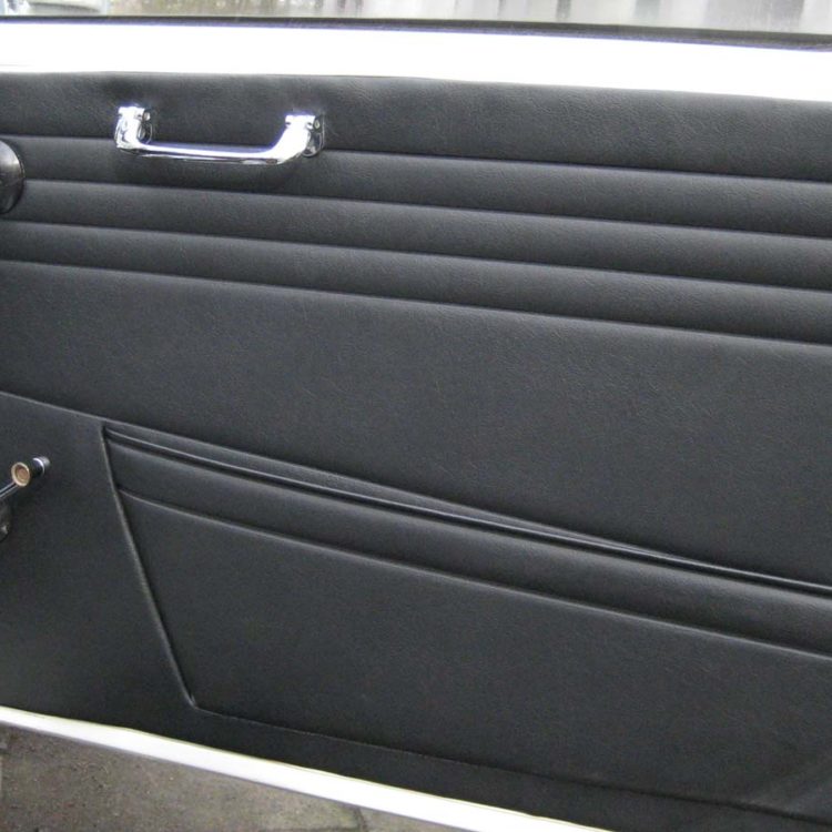 Triumph TR4A fitted with Black Vinyl Door Panel Trims.