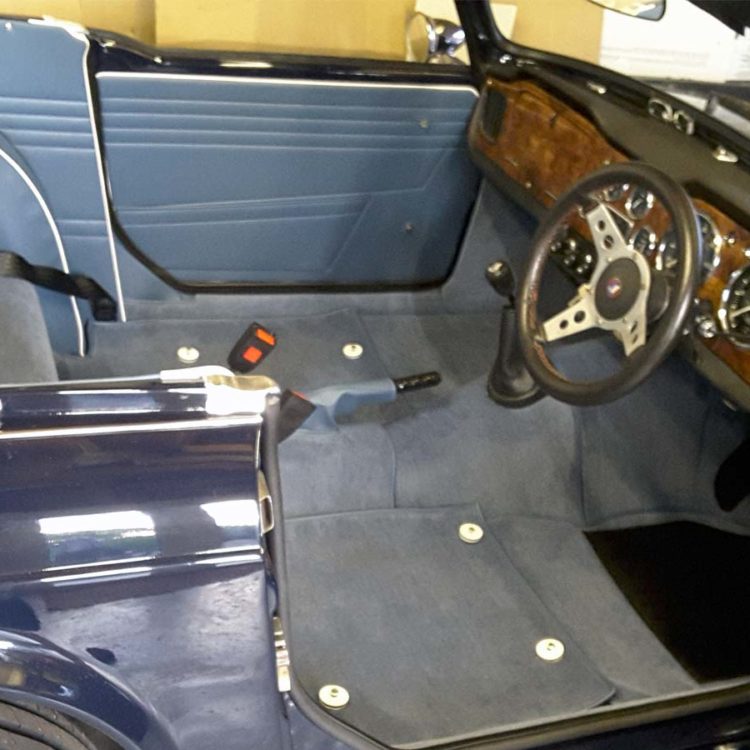 Triumph TR4A fitted with Shadow Blue Vinyl Interior Trim Panels, and Shadow Blue Nylon Carpets