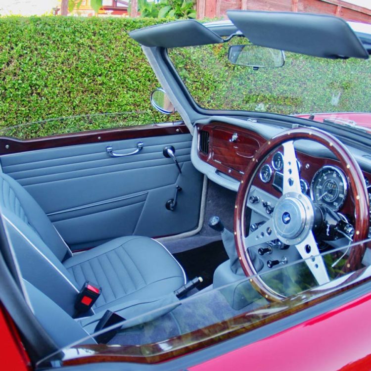 Triumph TR4A fitted with French Blue Vinyl Door Panels, Sunvisor Units, LeatherFaced Front Seats (TR6), and Saville Grey Wool Carpets