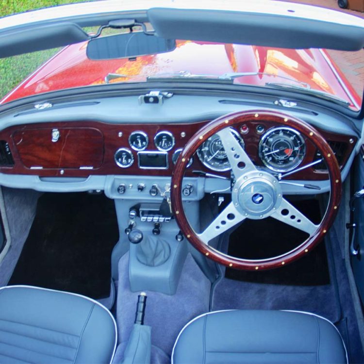 Triumph TR4A fitted with French Blue Vinyl Trim Panels, Dash & Console Assemblies, and Sun visor Units.