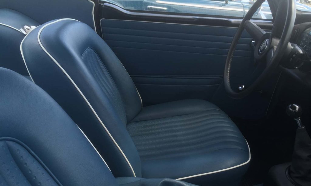 Triumph TR5 / TR250 fitted with Shadow Blue Vinyl Interior Trim Panels, and Front Seat Covers.