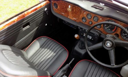 Triumph TR5 / TR250 fitted with a Black Interior Trim Panels (Custom Spec), Front Seat Covers, Dash and Console Coverings, and Black Wool Carpets.