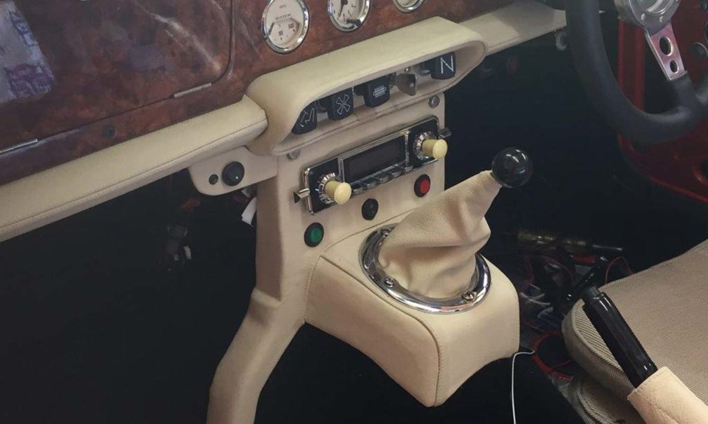 Triumph TR5 / TR250 fitted with Parchment Leather Lower Crashpads, Switch Plinth Cover, and Centre Console H Frame.