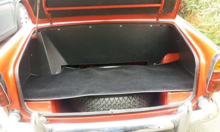Triumph TR5 (Petrol Injection) fitted with a Blackgrain Millboard Boot Liner Fuel Tank Board, Side Panels, and Wool Boot Mat.