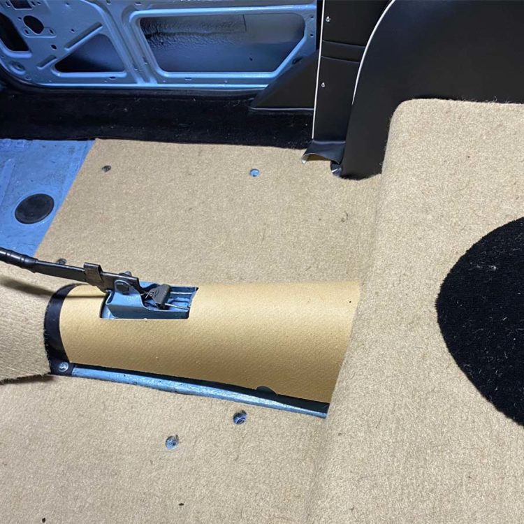 Triumph TR5 / TR250 fitted with a Hardboard Propshaft Tunnel Panel, and a Jute Felt Undercarpet Soundproofing Kit.