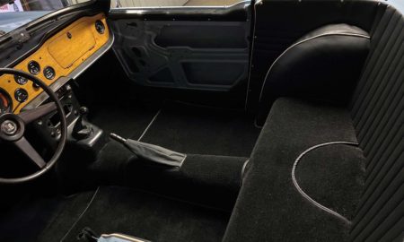 Triumph TR5 / TR250 fitted with a Black Nylon Carpet Set, with Leather Handbrake Cover.