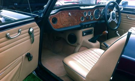 Triumph TR5 / TR250 fitted with Barley Beige Vinyl Trim Panels, Centre Console H Frame & Side Panels, LeatherFaced Front Seats, and Cinnamon Wool Carpets.