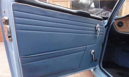 Triumph TR5 / TR250 fitted with Shadow Blue Vinyl Door Panel Trims, and Shadow Blue Wool Carpets.