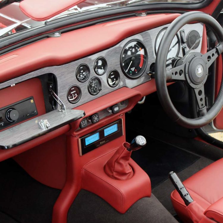 Triumph TR6 fitted with Bentley Red Leather Interior Trim Panels, and Anthracite Wool Carpets (Customers Materials).