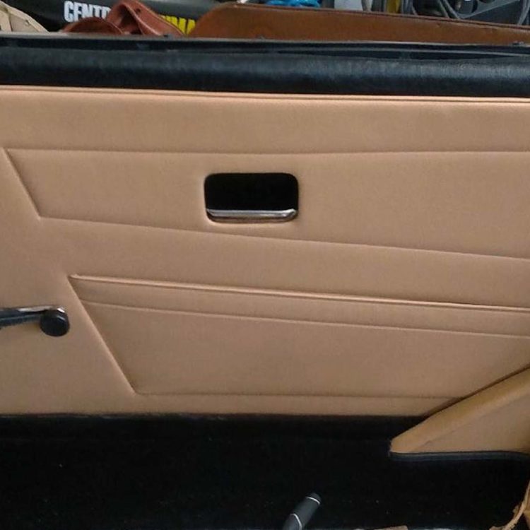 Triumph TR6 fitted with Biscuit Light Tan Vinyl Door Casing Panels, B Post Gusset Panels, and Black Wool Sill Carpets.