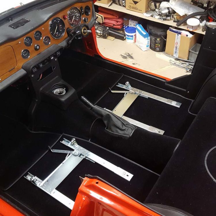 Triumph TR6 fitted with a Black Wool Carpet Set, and Black "RG" Vinyl Interior Trim Panels.
