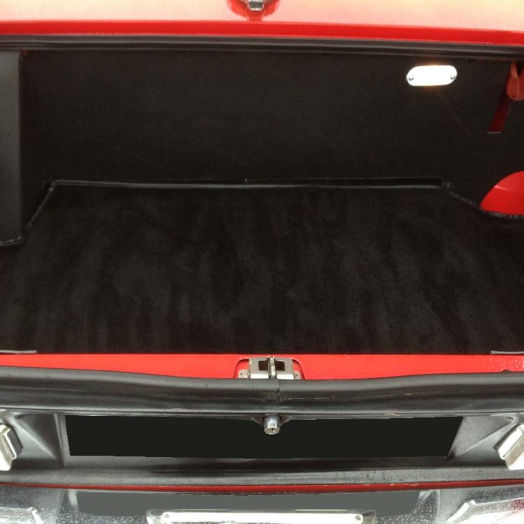 Triumph TR6 (Petrol Injection) fitted with Blackgrain Millboard Trunk Liner Panel Set, and a Black Nylon Trunk Mat.