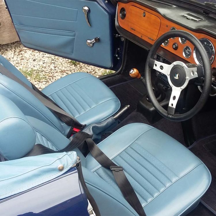 Triumph TR6 fitted with Shadow Blue Vinyl Interior Trim Panels, and Front Seat & Headrest Covers (CF/CR).
