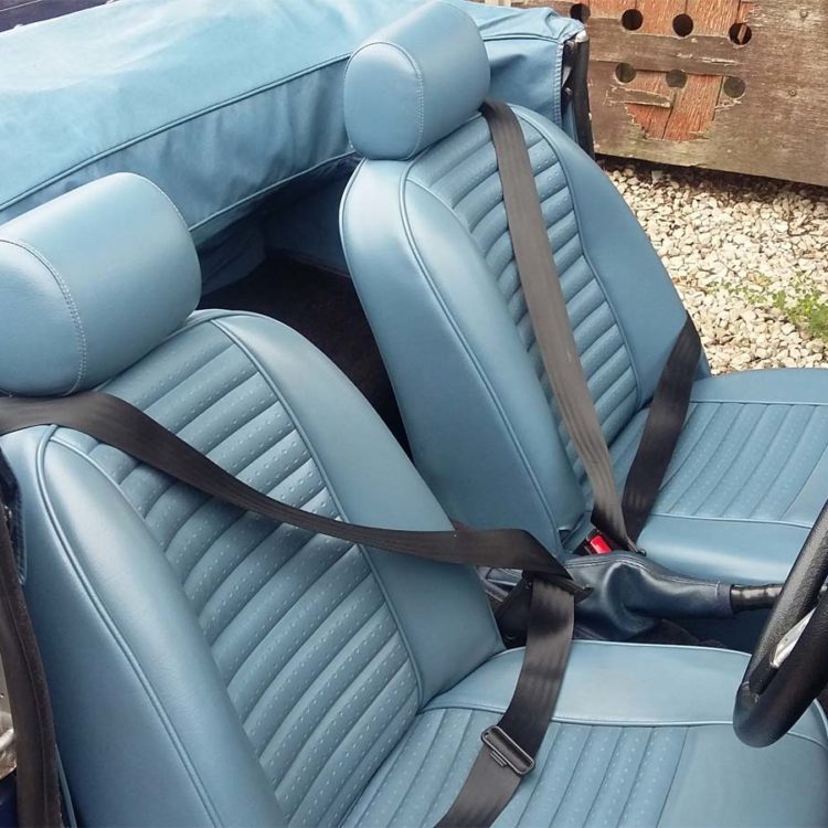Triumph TR6 fitted with Shadow Blue Vinyl Interior Trim Panels, and Front Seat & Headrest Covers (CF/CR).