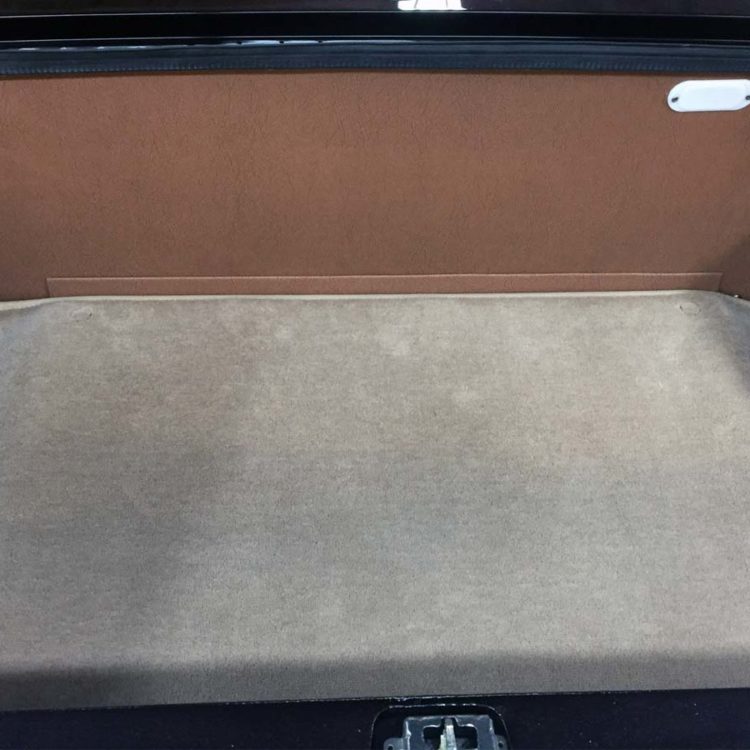 Triumph TR6 (Carburettor) Trunk Panel Kit trimmed with Cinnamon Vinyl, and Fawn Wool Boot Mat Carpet.