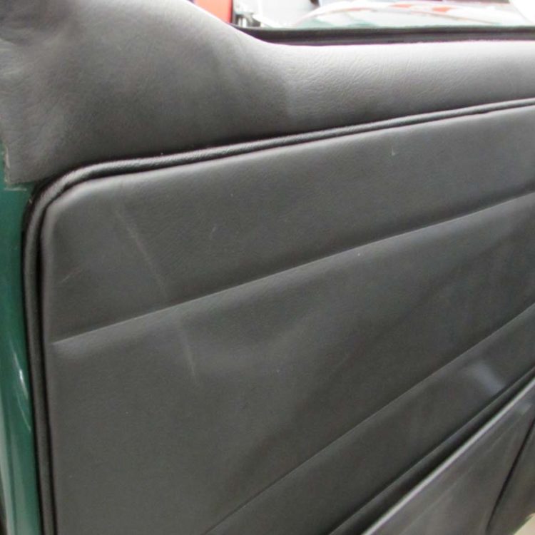 Triumph TR6 fitted with a Black Leather Upper Door Cover, and Door Assembly Panel.