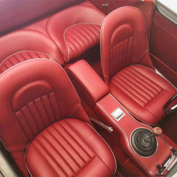 Austin Healey BJ8 (3000) fitted with Matador Red Vinyl Trim Panels, Front & Rear Seat Covers, & a Phase 1 Centre Armrest.