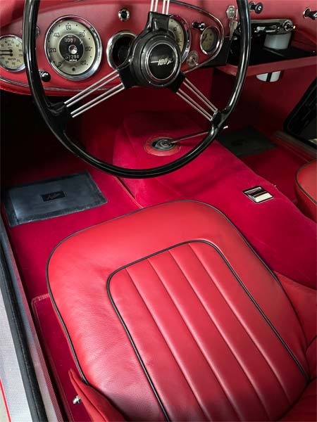 Austin Healey BN6 (100-6) fitted with a Cherry Red Leather Front Seat Covers, and Red Wool Carpets.