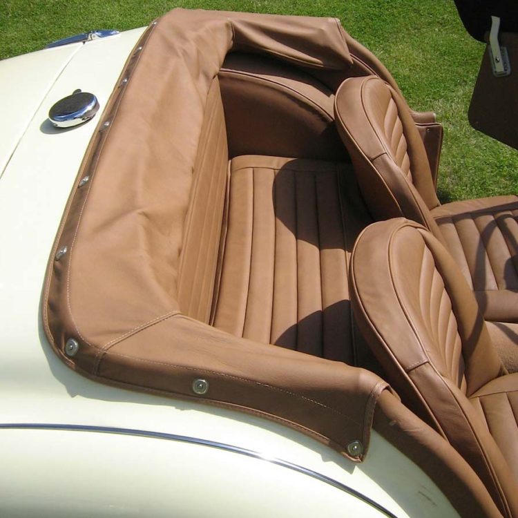 Triumph TR3A/B fitted with Cinnamon Leather Front & Rear Seats, Wheelarch Covers, and Hood Frame Cover.