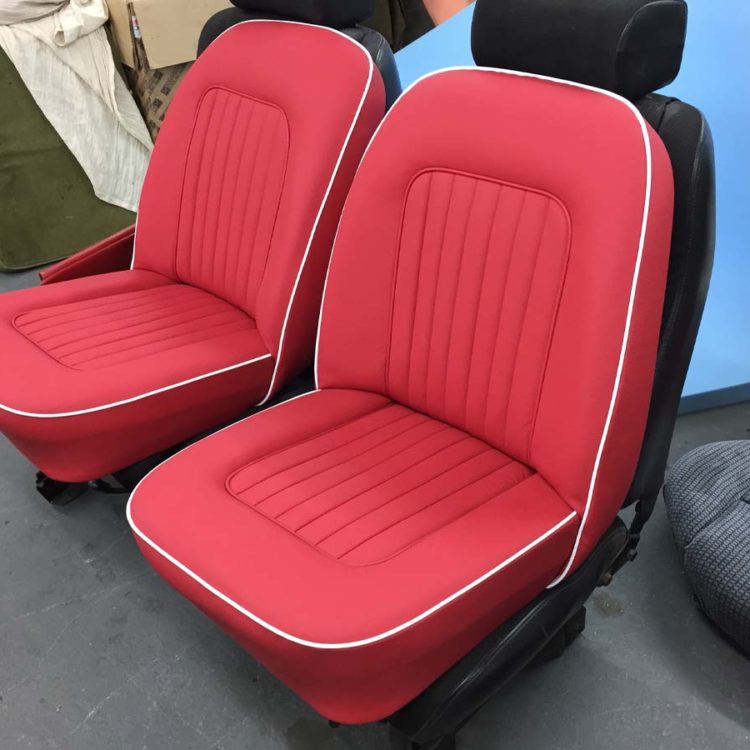 Triumph TR4A Front Seats fully trimmed in Bright Red Leather.
