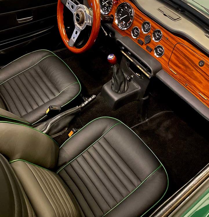 Triumph TR6 fitted with a Leather Front Seat Covers (Pre CC50k), and Leather Dash, Crashpad and Switch Plinth Covers.