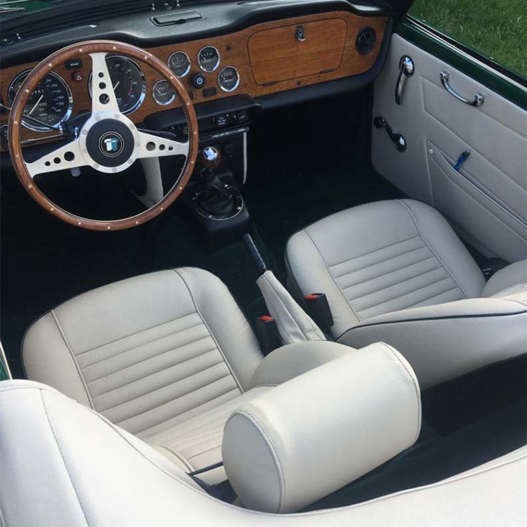 Triumph TR6 fitted with Sand Leather Interior Trim Panels, Front Seat & Headrest Covers (CF/CR), & Dark Green Wool Carpets.