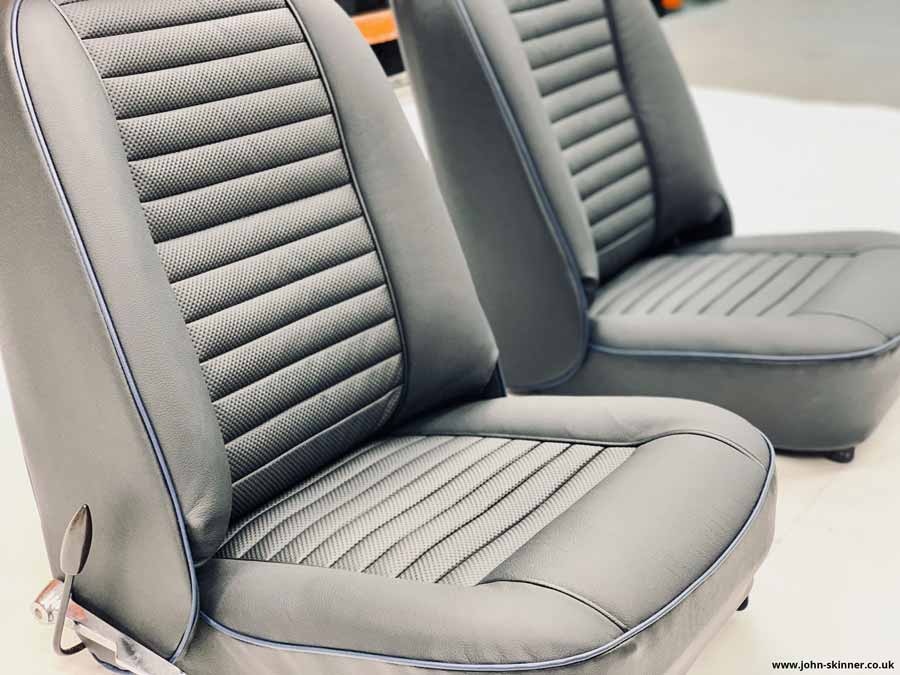 Triumph TR6 LeatherFaced Front Seats with bespoke Perforated Embossed finish to the leather pleats and a custom blue piping.